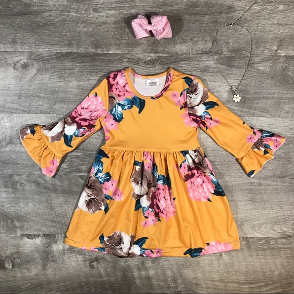 Other - Boutique Mustard yellow bell floral dress